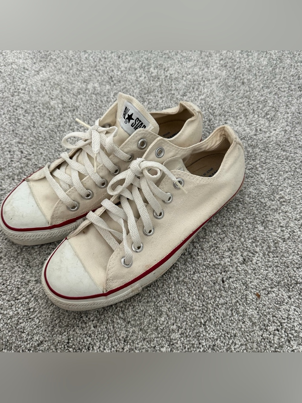Converse low-top sneakers in cream with red stripe